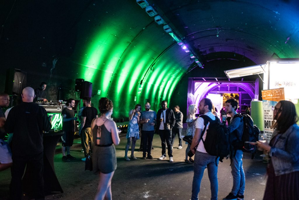 The Traverse 19 attendees party on the opening night in the former road tunnels by the river in Trento.