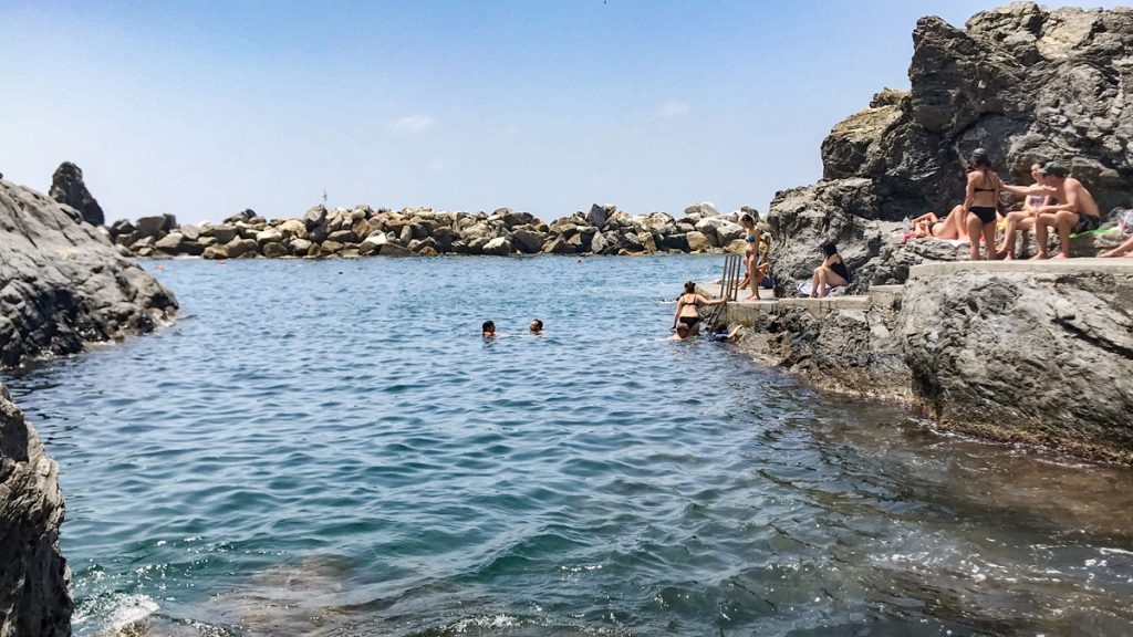 Visiting Cinque Terre means going for a swim in the clear waters