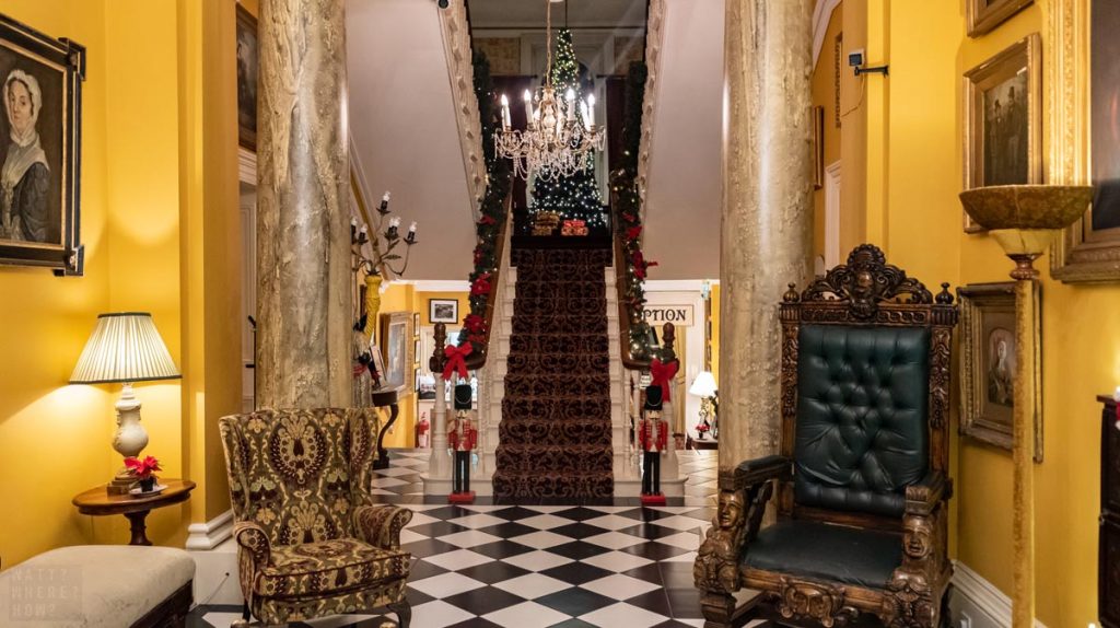 The grand entry into Ballyseede Castle has checkered tiles and crystal chandeliers. 