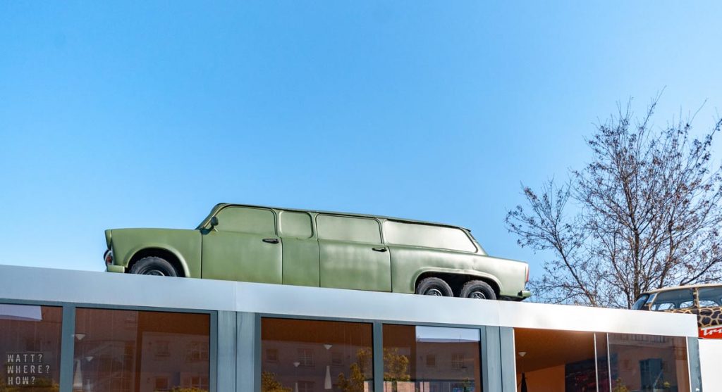 You can spot the entrance to Trabi Safari by the number of cars including the military-edition limousine on the roof. 