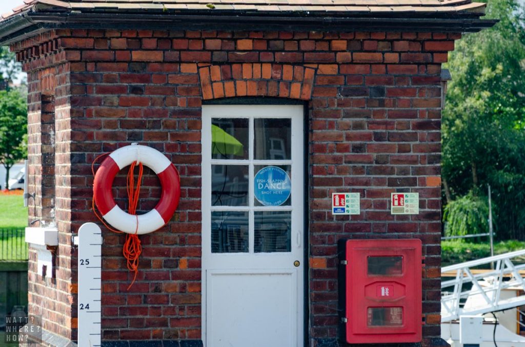 The red brick house on the lock hasn't changed since they filmed the Fish Slapping Dance. 