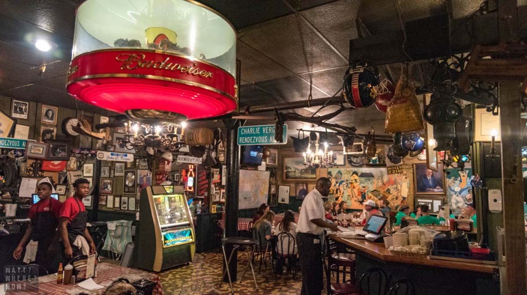 Inside Charles Vergos Rendezvous BBQ, it's like stepping back 50 years with its kitschy ephemera and old advertising signs. 