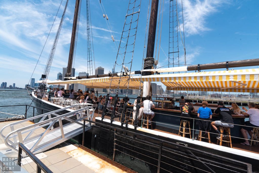 Pilot NYC is a converted vessel that is now a floating bar and restaurant offering stunning views of Manhattans Financial District. 