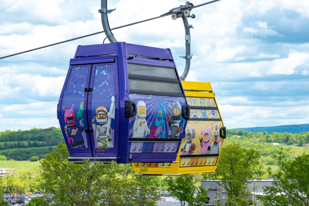 The Legoland New York Mini Sky Flyer is a gondola system with colorful carriages that carry families above the Miniland and Lego Pirate lands. 